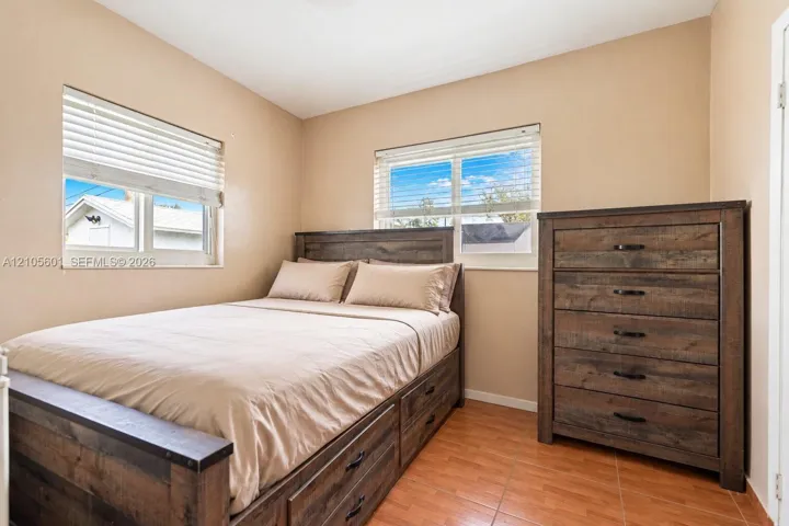Warm neutral wall color and wood-finish flooring