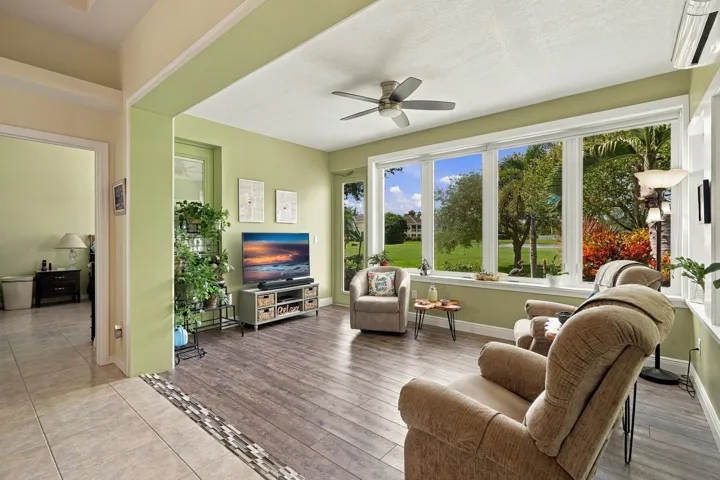 Sunroom provides for extra square footage and is an additional year-round room to enjoy
