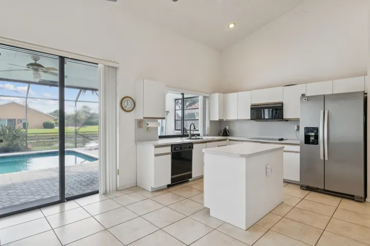 Kitchen overlooking the pool & lake