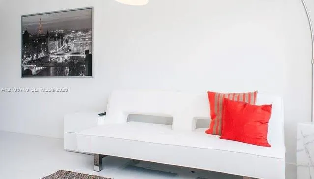 Neutral walls and white seamless flooring