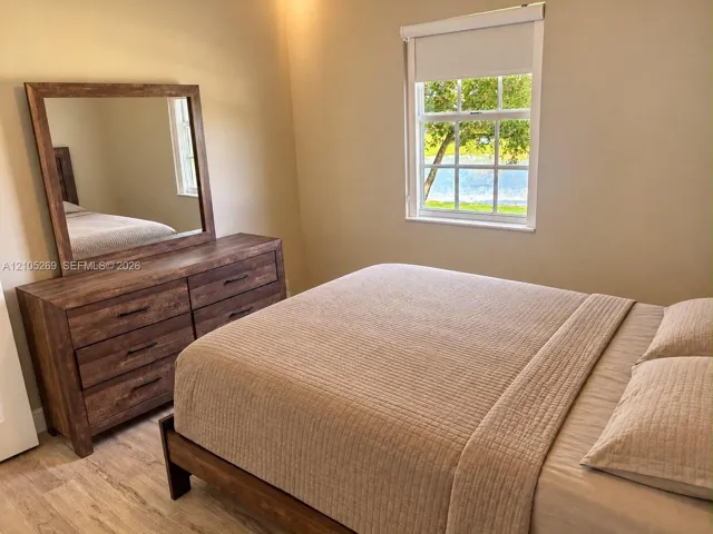 Wood-finish flooring with a neutral wall color