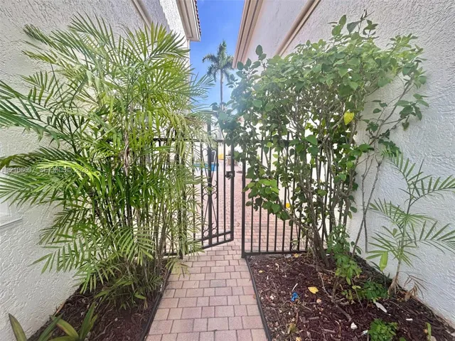 Side entry leading to the boat dock, back area