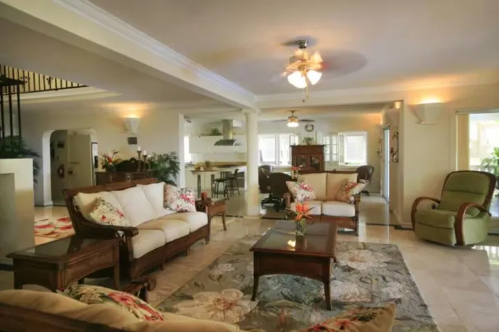 Spacious interior featuring comfortable seating and an inviting dining space.