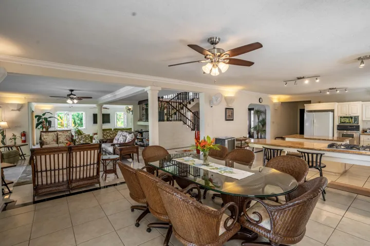 Spacious dining area flowing into the kitchen and living spaces.