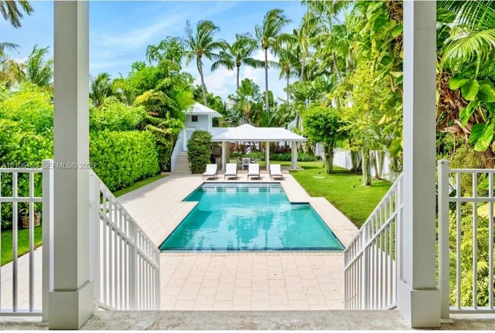 covered bbq area and pool bath