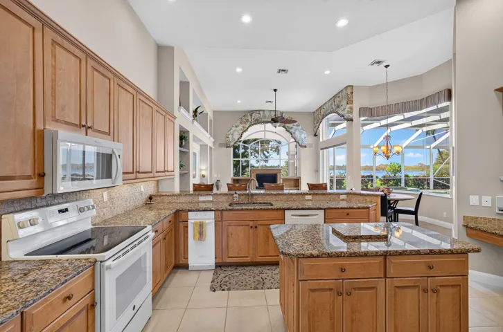 KITCHEN OPEN TO FAMILY ROOM