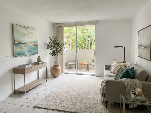 Neutral tile flooring, sliding glass door, and private balcony