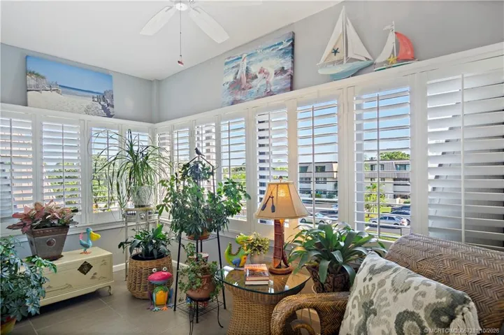 Comfortable Sun Room - Plantation Shutters, Wood Grained Tiled Floor - Wonderful additional Living Space, Office, TV or Guest Room...