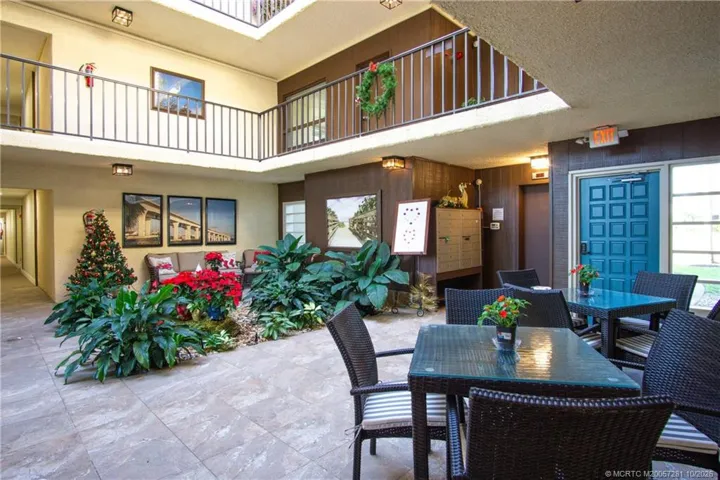 Back Blue Door leads to path for Pool and Bath House shared by only 5 Buildings. There is also a large pool in the Clubhouse Complex which all Conquistador Residents may use!