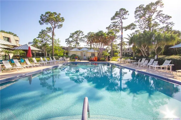This Courtyard Pool is for the use of only 5 buildings that form a circle around this area. There is also the large Pool in the Clubhouse Complex available for the use of ALL Conquistador Residents. Bathhouse is in the background. The Pool is heated in the "winter" and Chilled in the hot summer months.