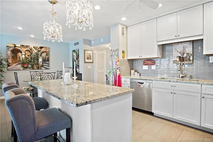 Elegance abounds in this CONDO - Offered Completely Furnished, including tasteful Furnishings and Decorative items - just move in - or purchase for an Investment - SEASONAL RENTS are currently $3800-$4000/month!