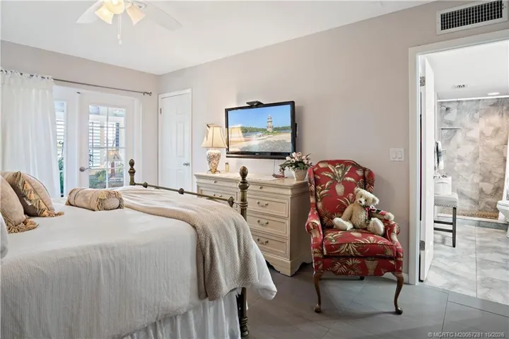 French Doors open to the Sun Room - En-Suite is on the right