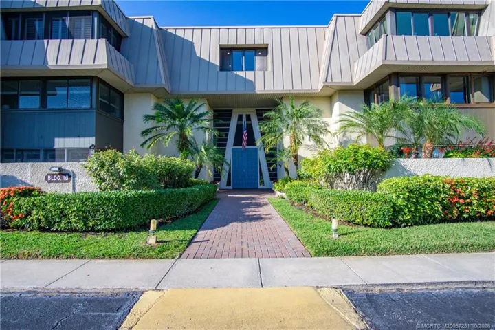 Welcome to Building 10. ELEVATOR and Pet Friendly (weight restriction) Building. Lush green entryway to Double Doors which open to Atrium.