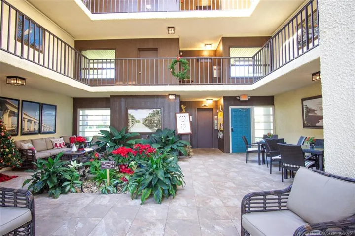 Open Air Atrium with New Flooring, Paint and Lighting.