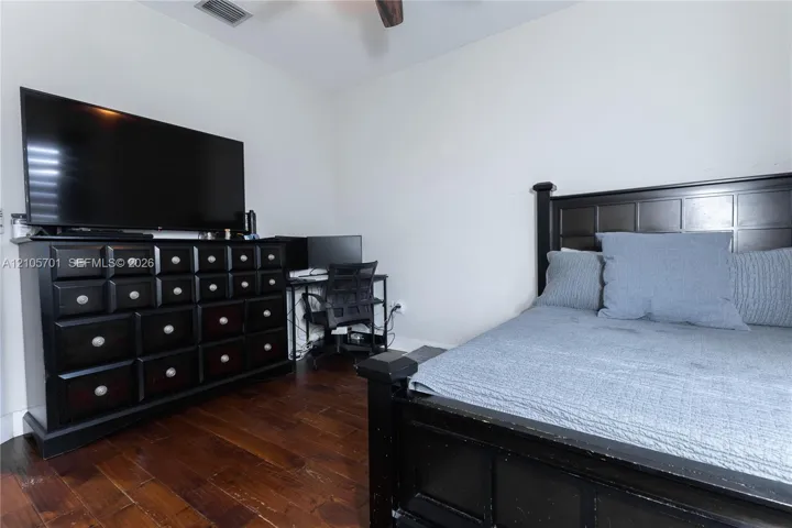 Wood-finish flooring and ceiling-mounted lighting