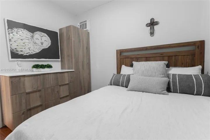 Wood-finish cabinetry featuring clean lines and a neutral top surface