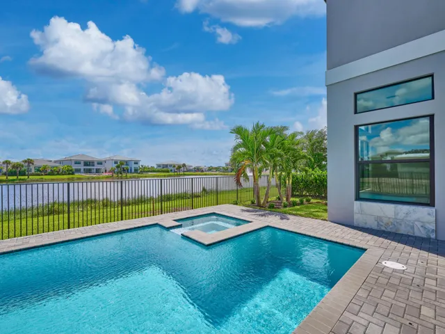 Pool and Spa Overlooking Lake (South Facing Backyard)