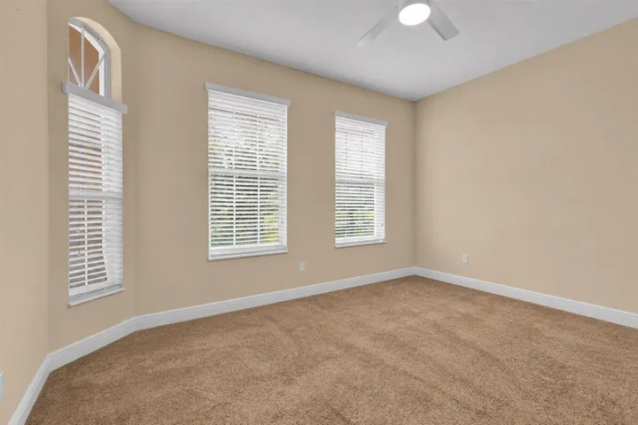 Empty Beige Room with Arched Windows