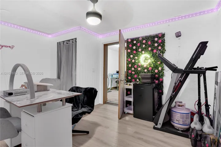 Wood-finish flooring and integrated ceiling light fixture