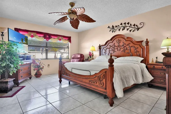 Tile flooring and ceiling-mounted decorative fan