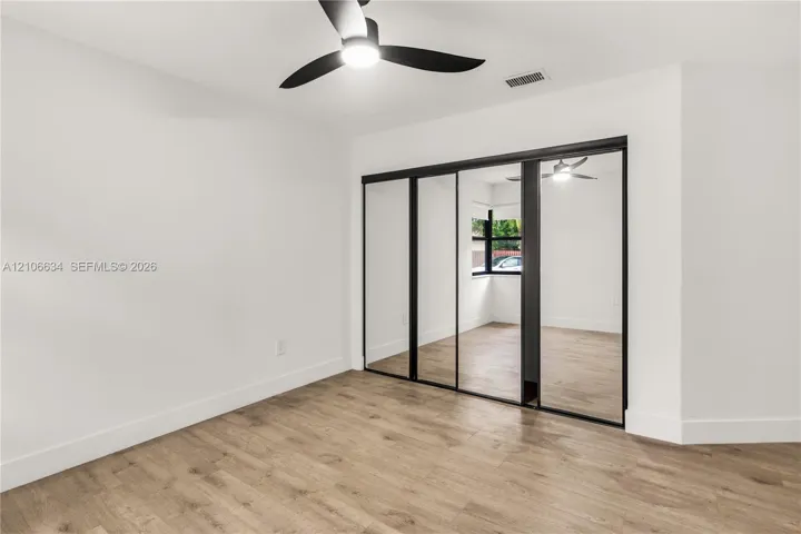 Second bedroom - mirrored closet sliding doors
