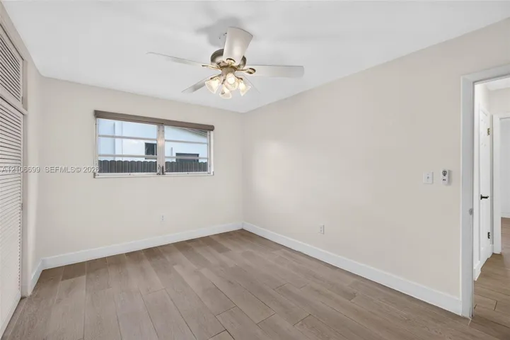 Guest bedroom w/ new plank wood look tile