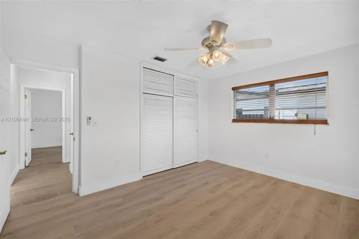 Guest bedroom w/ new plank wood look tile