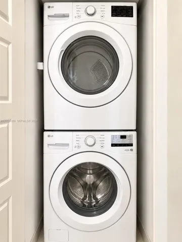 Stacked high-efficiency front-loading washer and dryer unit