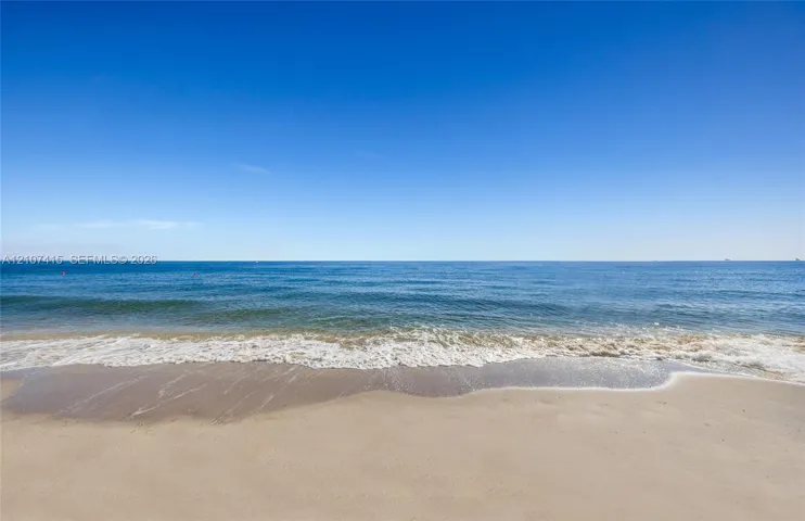 Sandy beachfront featuring immediate water access