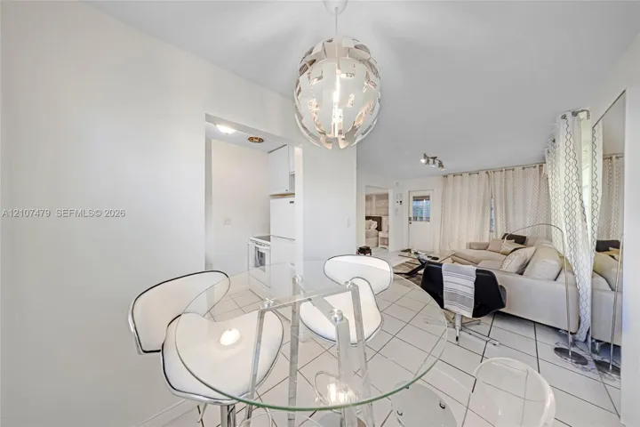 Tiled flooring and large-scale spherical pendant lighting