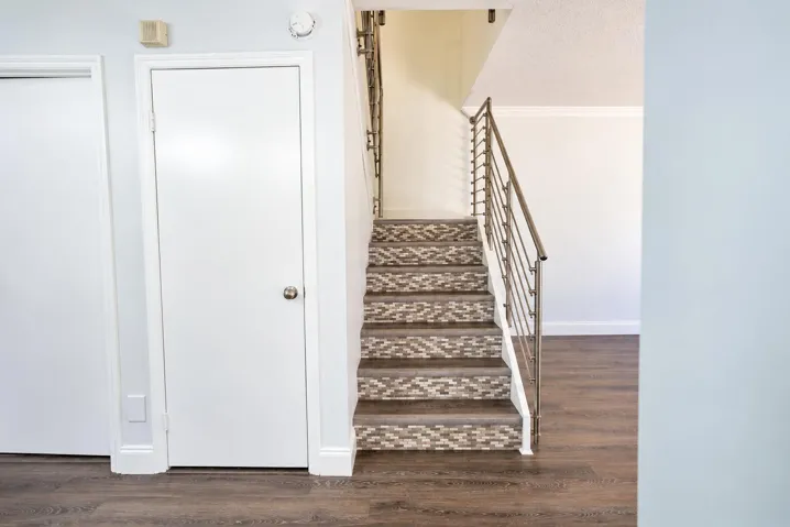 Stairs lead to the upstairs main bedroom and 2nd bedroom