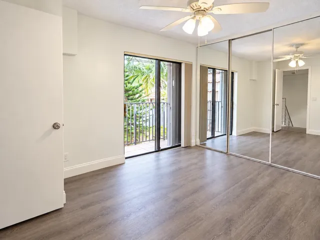 2nd bedroom - Sliding doors leading out to patio overlooking courtyard