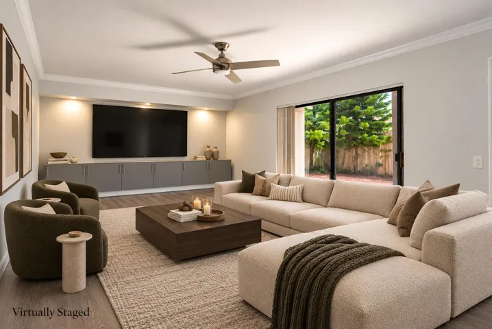 Virtually staged living room - sliding door leads out to courtyard