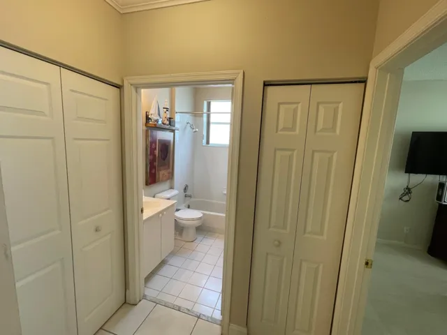 Hallway 2nd bathroom two closets