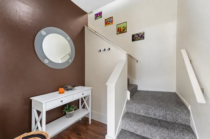 Modern Foyer with Pumpkin and Stairway