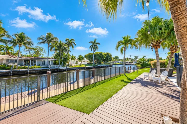 Sunlit Tropical Canal Backyard Retreat