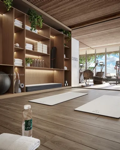 Yoga and pilates Floor-to-ceiling custom wood shelving with integrated LED lighting, linear wood-slat ceiling, wood-finish flooring, and expansive floor-to-ceiling windows. Sauna and showers