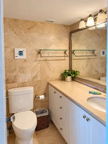 Warm Neutral Bathroom with Coastal Accen