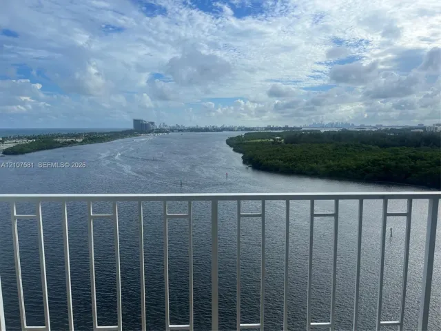 Waterfront scenery with distant city skyline
