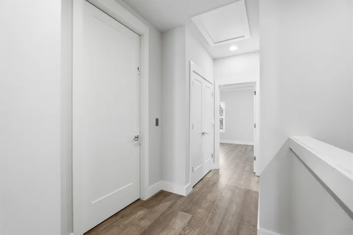 Elevator and entryway to primary bedroom