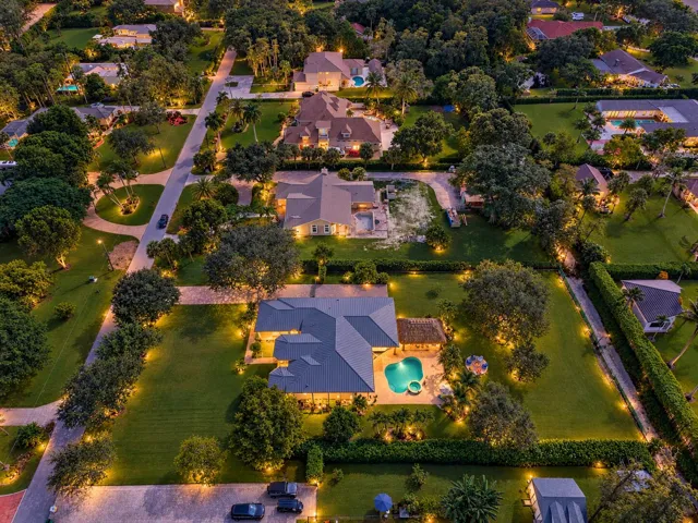 Twilight Estate with Glowing Pool