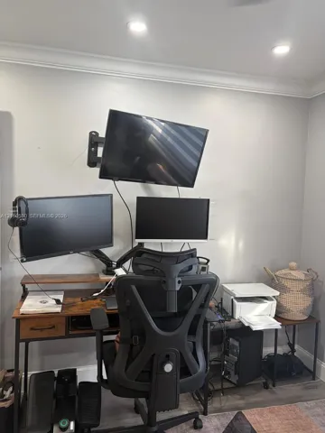 Wall-mounted television bracket and recessed ceiling lighting