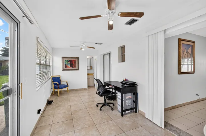 Enclosed patio - enlarged sqft compared to what is shown.