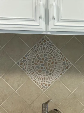 Custom backsplash over kitchen sinks.