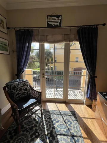 DEN W/FRENCH DOORS TO BALCONY