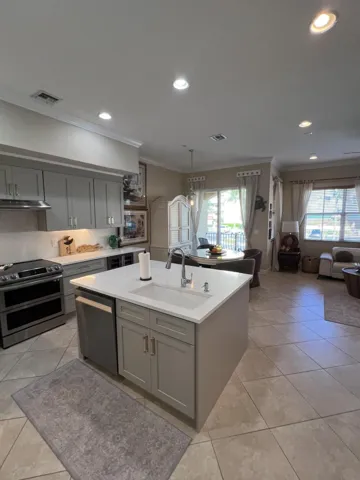 KITCHEN OPEN TO LIVING AREA