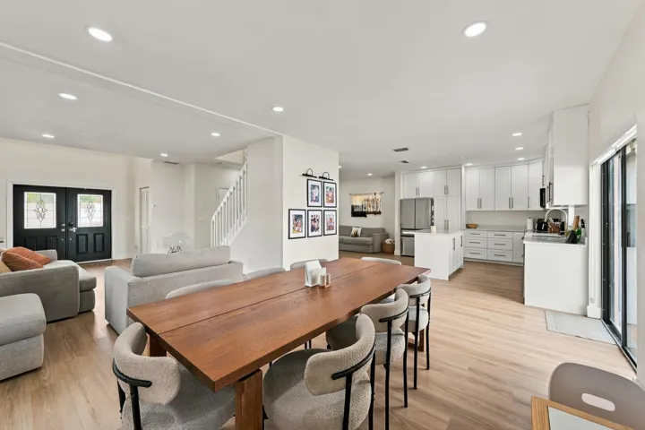 Open floor plan gives sight to Kitchen , front room and family room from the dining area.
