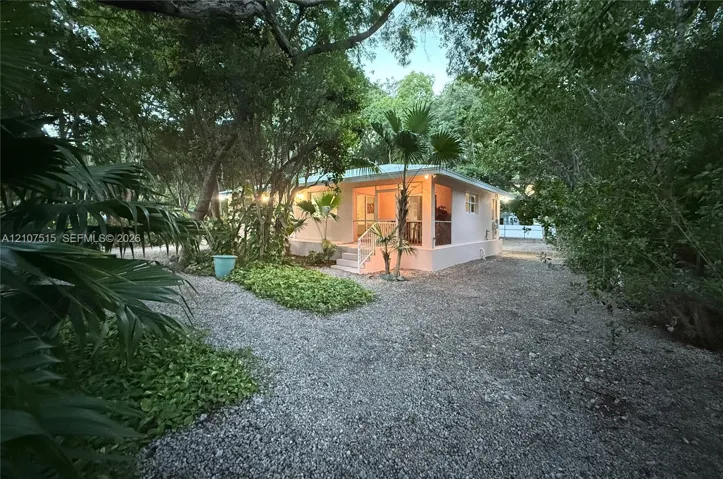 Separate entrance to the screened-in porch