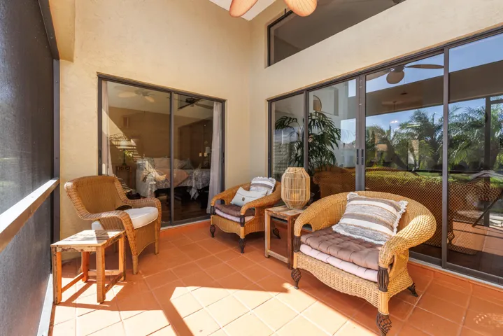 Relax in this Covered & Screen-in Patio Overlooking the Water!