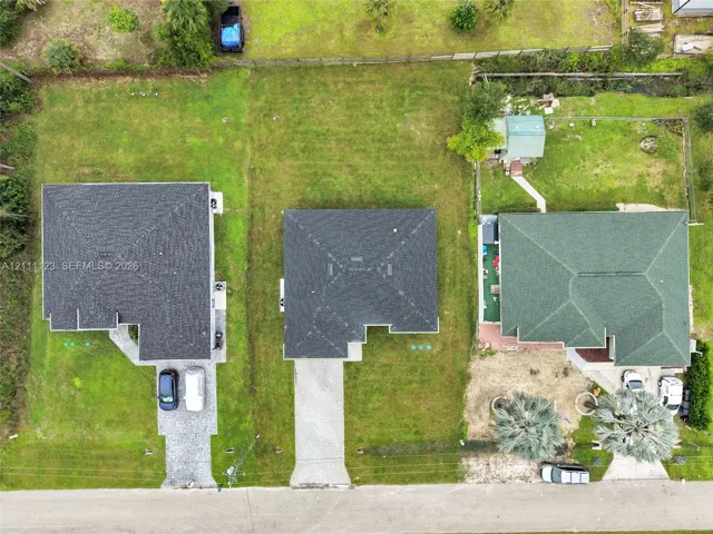 Overhead aerial view of the home and lot.